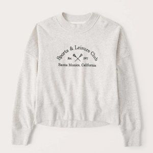 A&F Women's 90s Sharkbite Sports & Leisure Club Graphic Sweatshirt